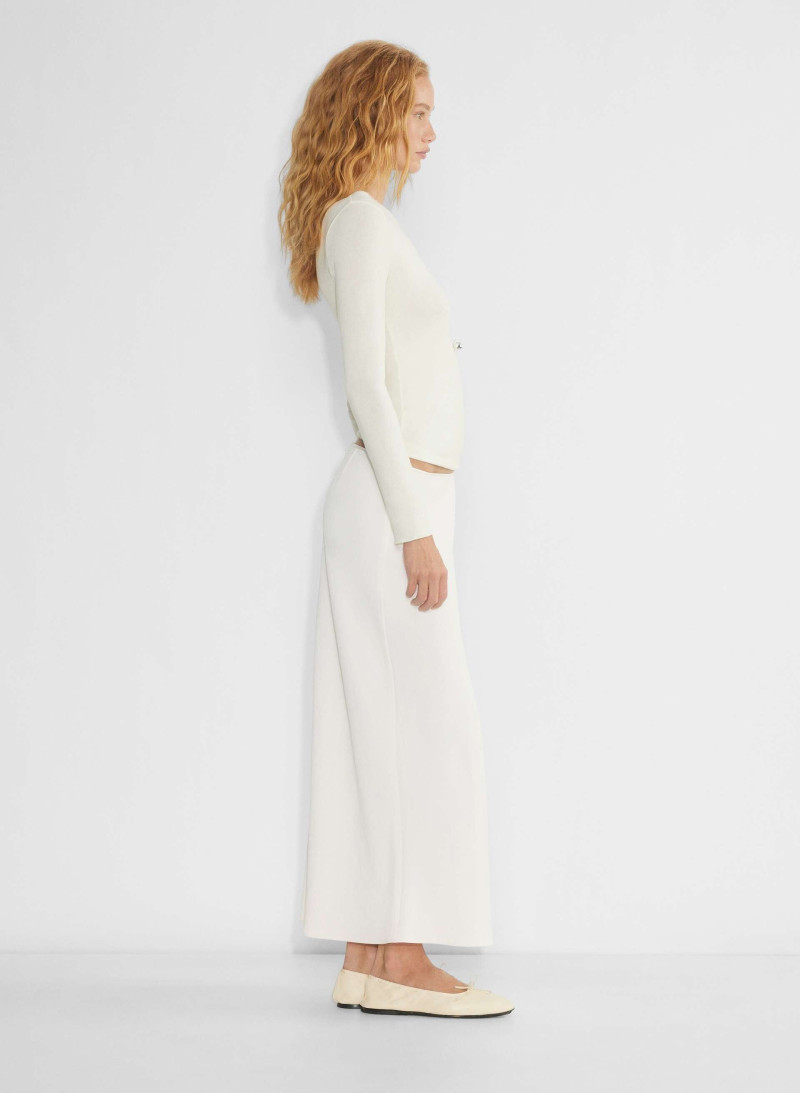 Tess Summer Carter featured in  the Aritzia catalogue for Winter 2024
