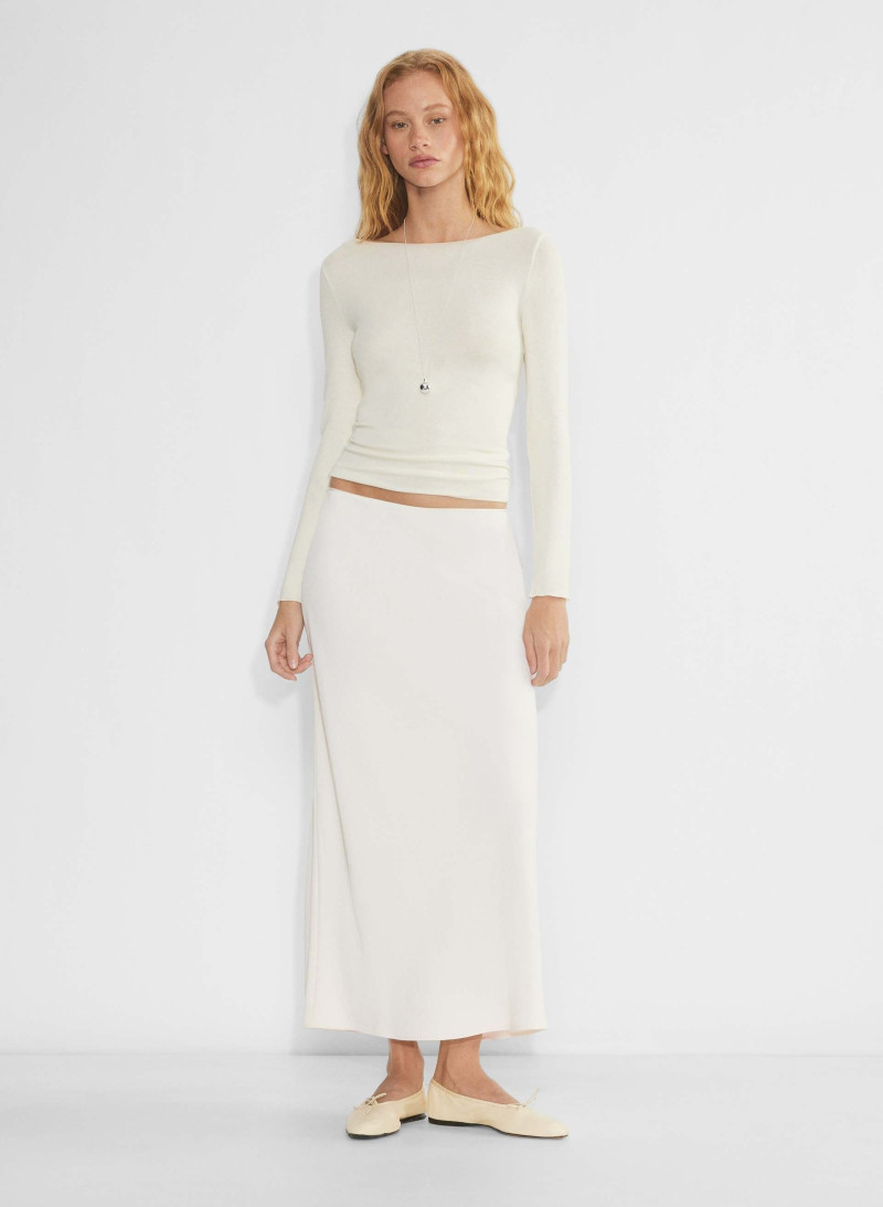 Tess Summer Carter featured in  the Aritzia catalogue for Winter 2024