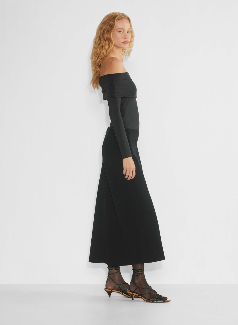 Tess Summer Carter featured in  the Aritzia catalogue for Winter 2024
