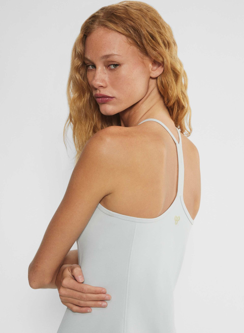 Tess Summer Carter featured in  the Aritzia catalogue for Winter 2024
