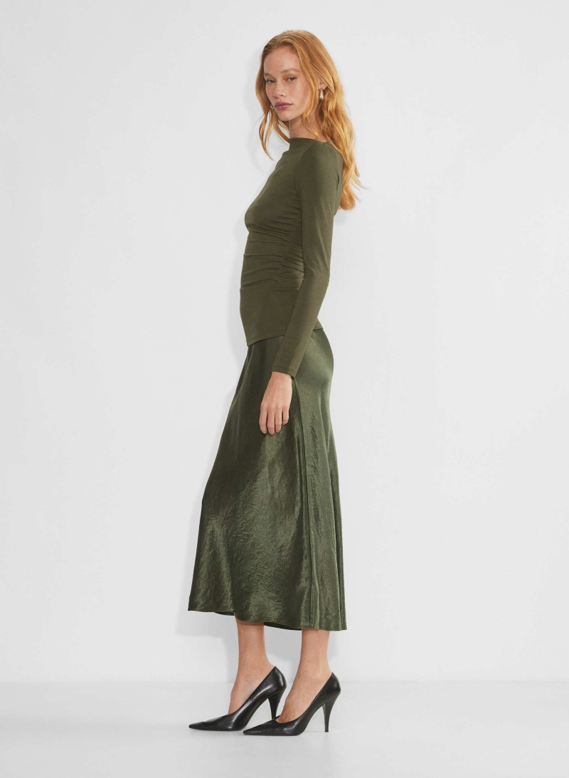 Tess Summer Carter featured in  the Aritzia catalogue for Winter 2024