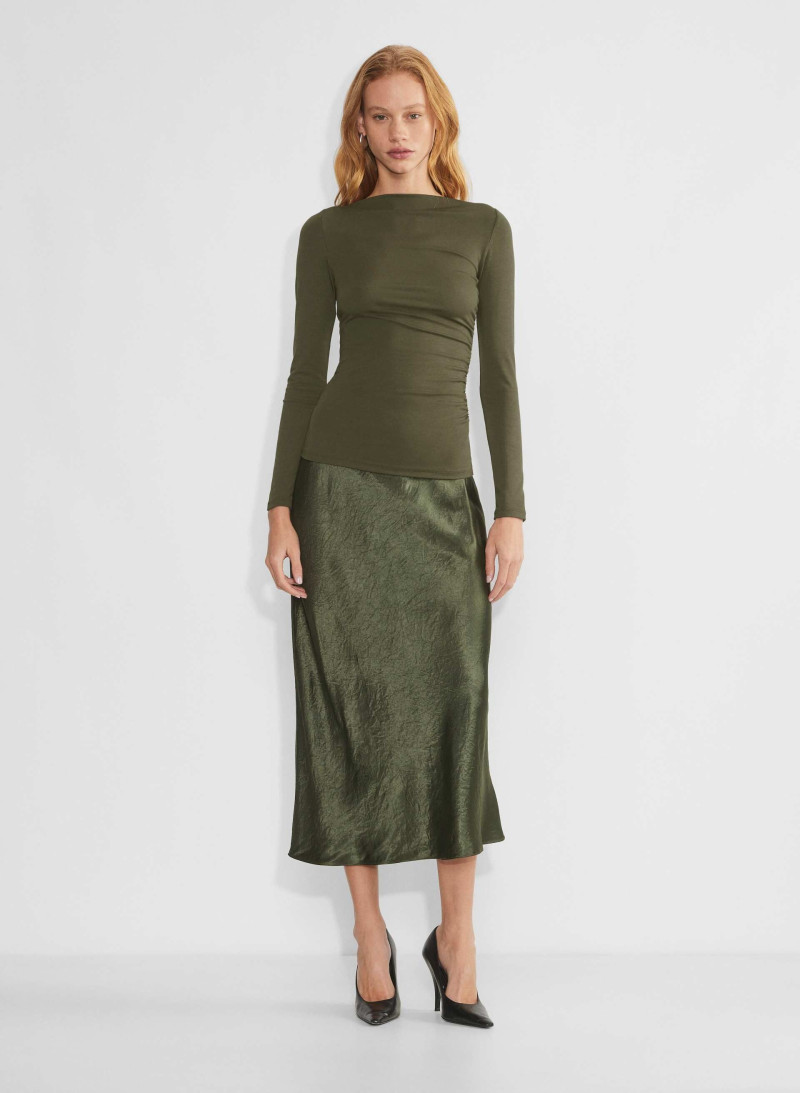 Tess Summer Carter featured in  the Aritzia catalogue for Winter 2024