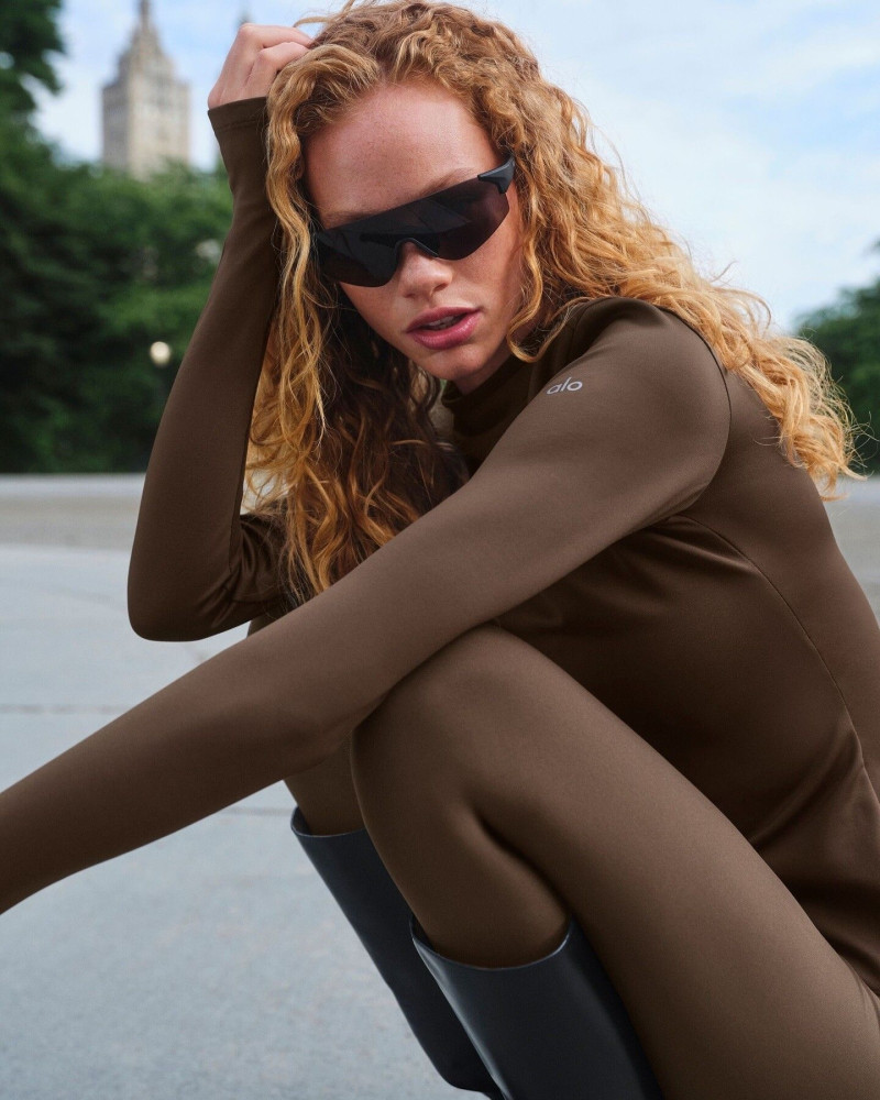 Tess Summer Carter featured in  the Alo Yoga catalogue for Winter 2024