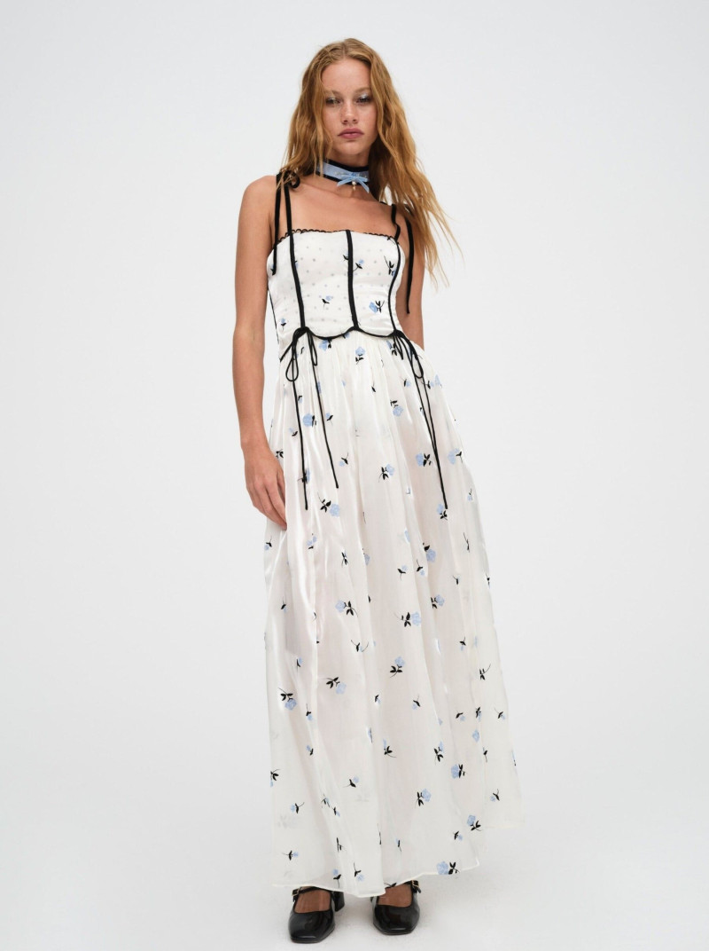 Tess Summer Carter featured in  the For Love & Lemons catalogue for Holiday 2023