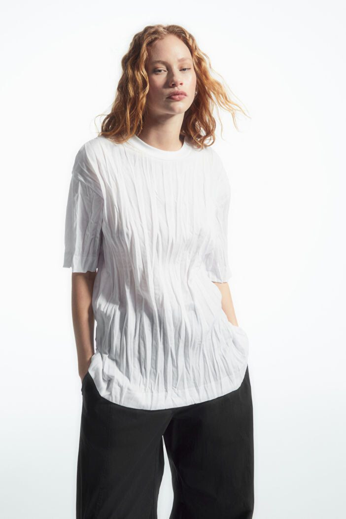 Tess Summer Carter featured in  the Cos Sweden catalogue for Spring/Summer 2024