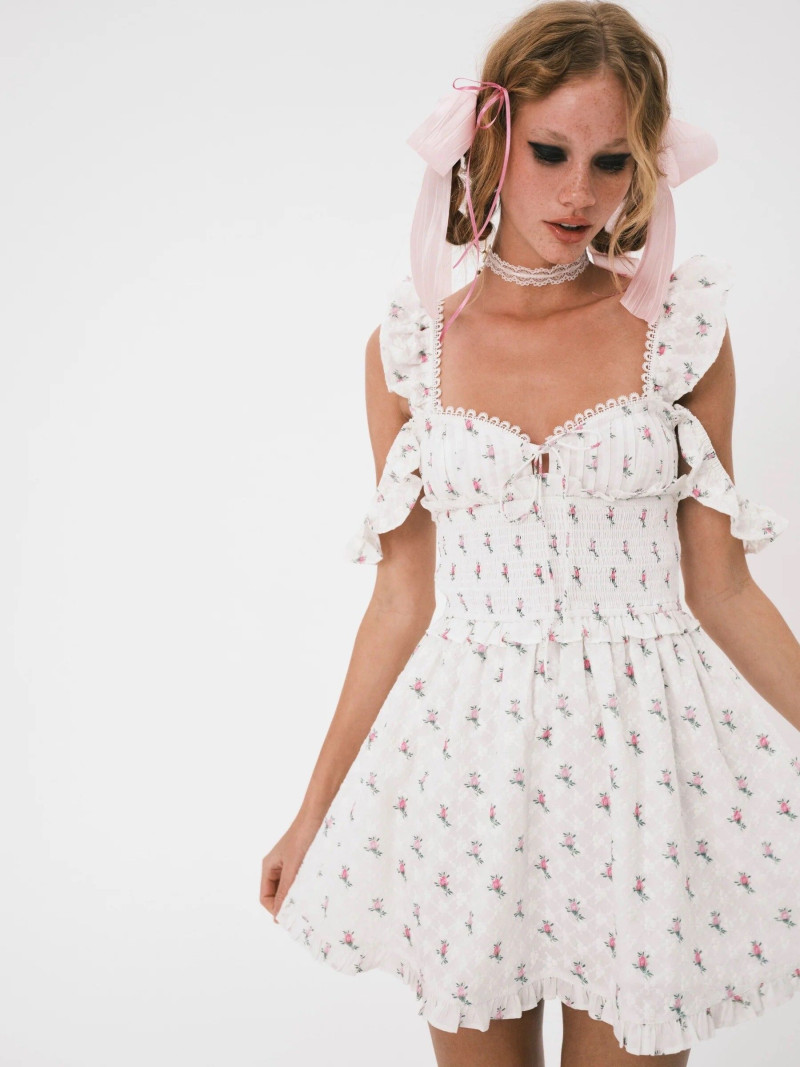 Tess Summer Carter featured in  the For Love & Lemons catalogue for Summer 2023