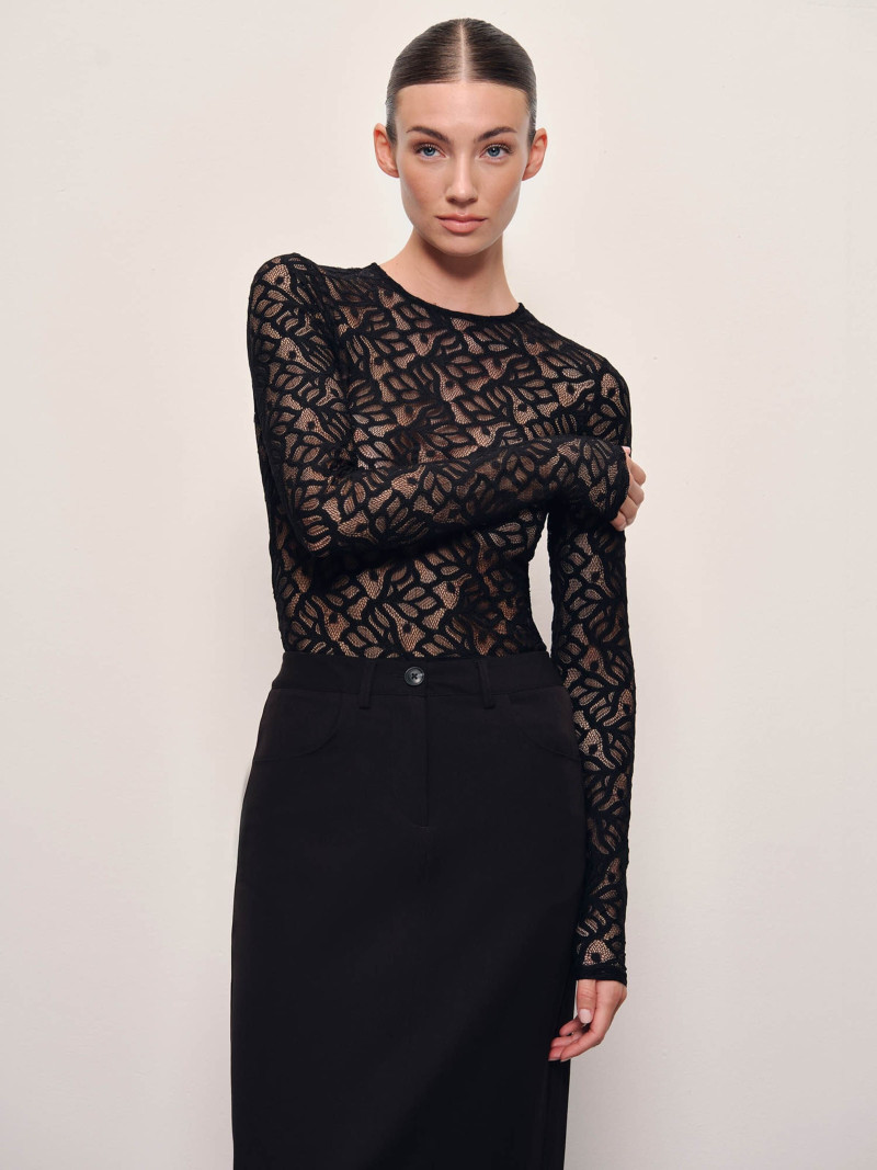 Lorena Rae featured in  the RAERE lookbook for Holiday 2024