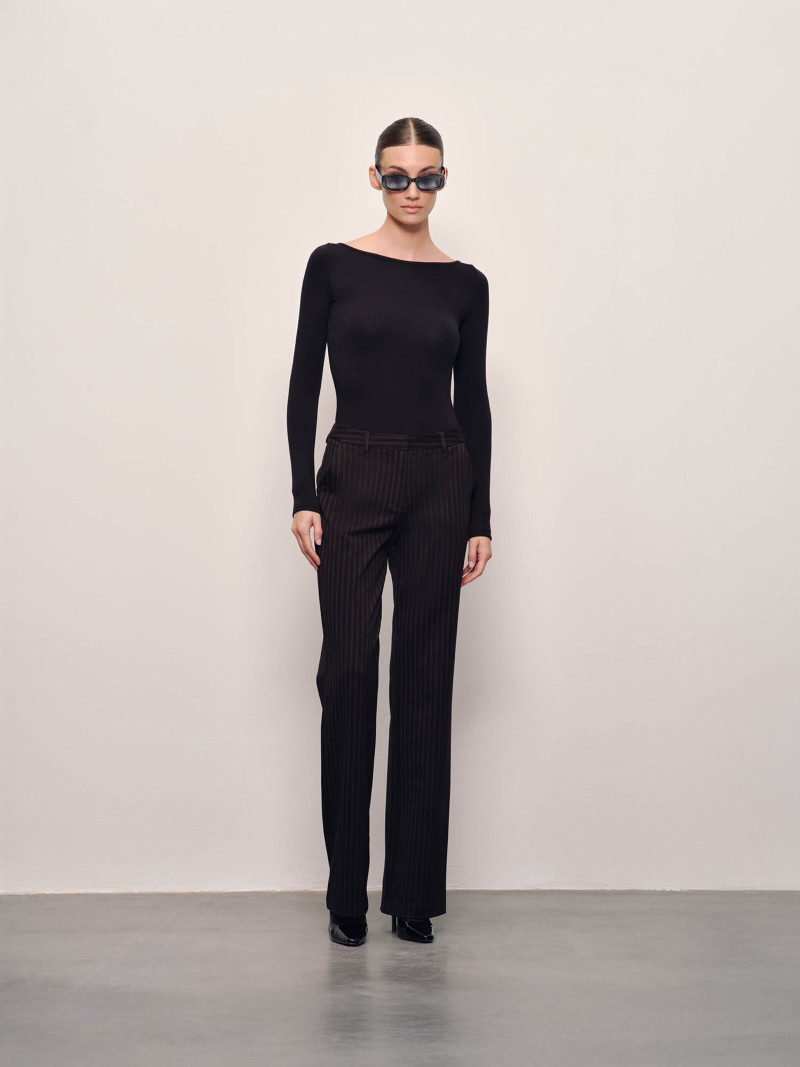 Lorena Rae featured in  the RAERE lookbook for Holiday 2024