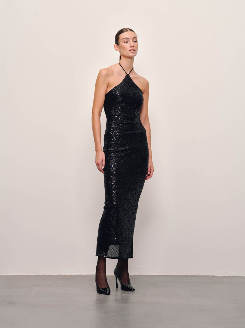 Lorena Rae featured in  the RAERE lookbook for Holiday 2024