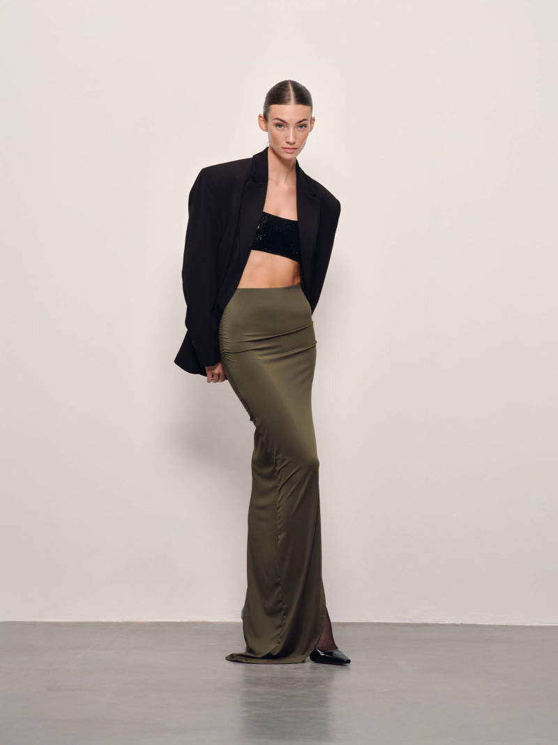 Lorena Rae featured in  the RAERE lookbook for Holiday 2024