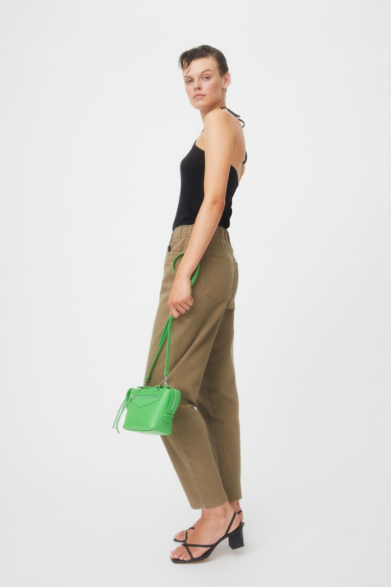 Cara Taylor featured in  the H&M lookbook for Pre-Fall 2022