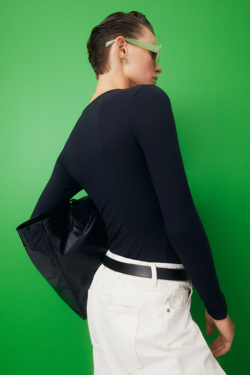 Cara Taylor featured in  the H&M lookbook for Pre-Fall 2022