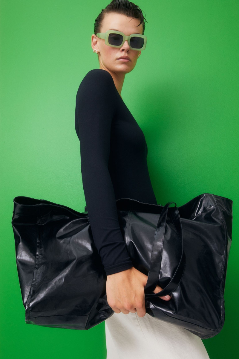 Cara Taylor featured in  the H&M lookbook for Pre-Fall 2022