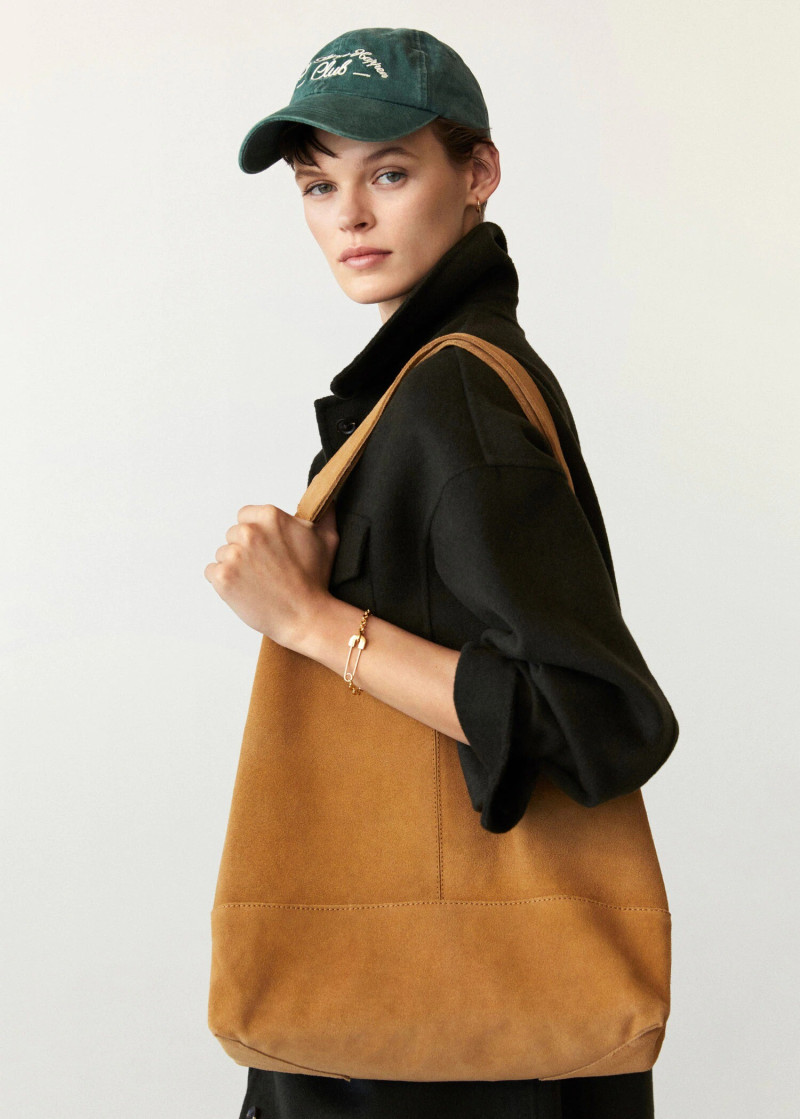 Cara Taylor featured in  the Mango Retro Exuberance catalogue for Spring/Summer 2022