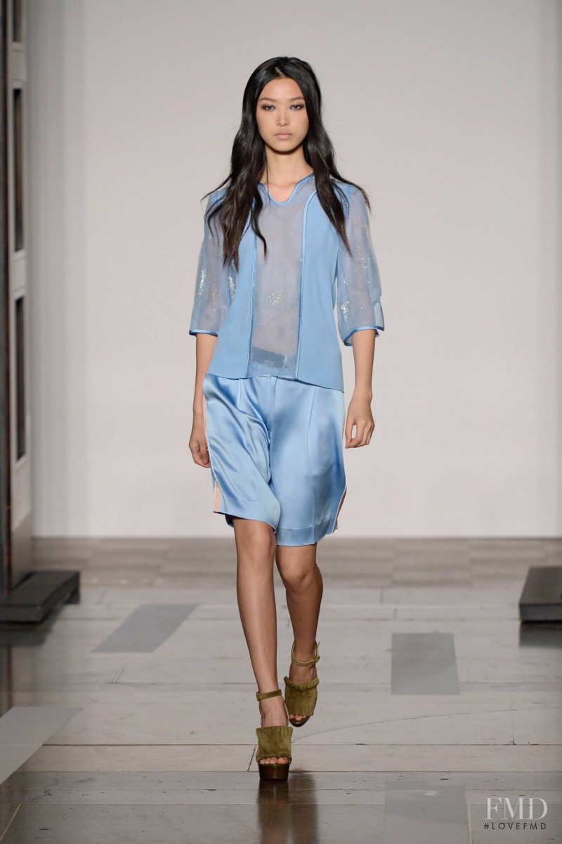 Tian Yi featured in  the Jonathan Saunders fashion show for Spring/Summer 2014