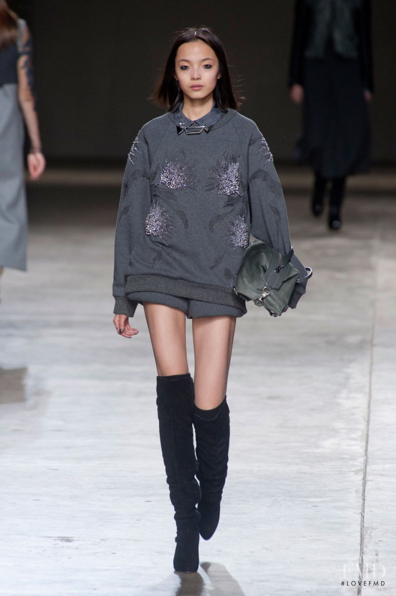 Xiao Wen Ju featured in  the Topshop Unique fashion show for Autumn/Winter 2014