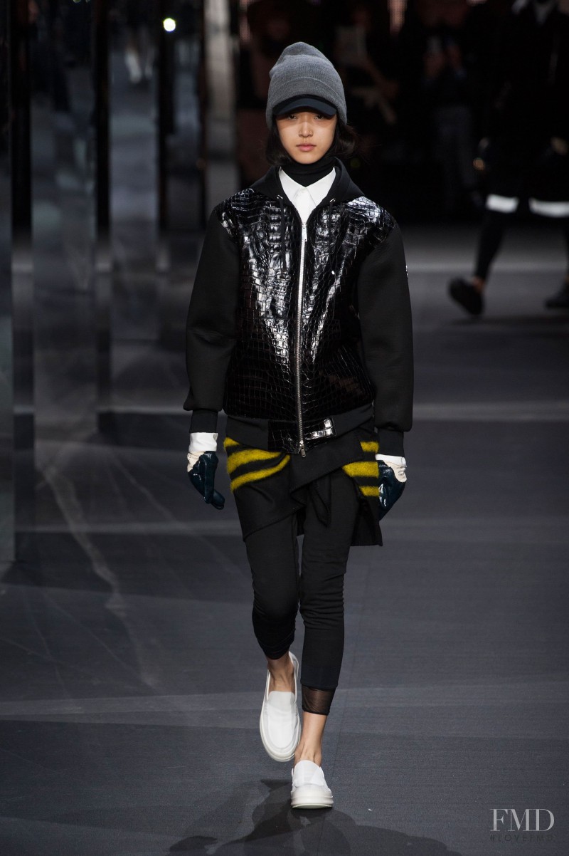 Tian Yi featured in  the Moncler Gamme Rouge fashion show for Autumn/Winter 2014