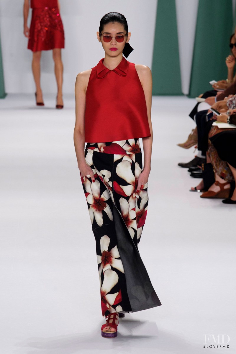 Ming Xi featured in  the Carolina Herrera fashion show for Spring/Summer 2015