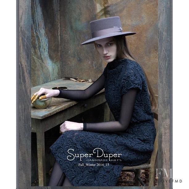 Sabina Lobova featured in  the SuperDuper Hats The Feminine Mystique advertisement for Autumn/Winter 2014