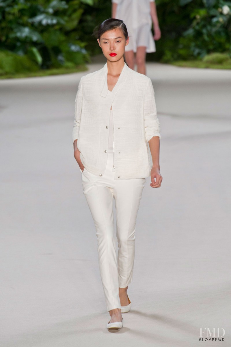 Tian Yi featured in  the Akris fashion show for Spring/Summer 2013