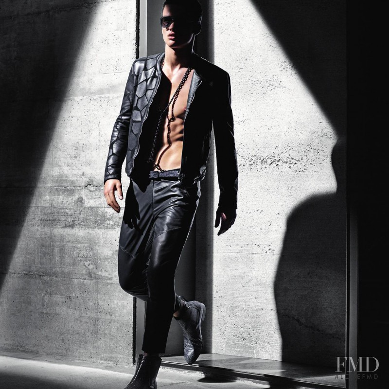 Simon Nessman featured in  the Emporio Armani advertisement for Spring/Summer 2011