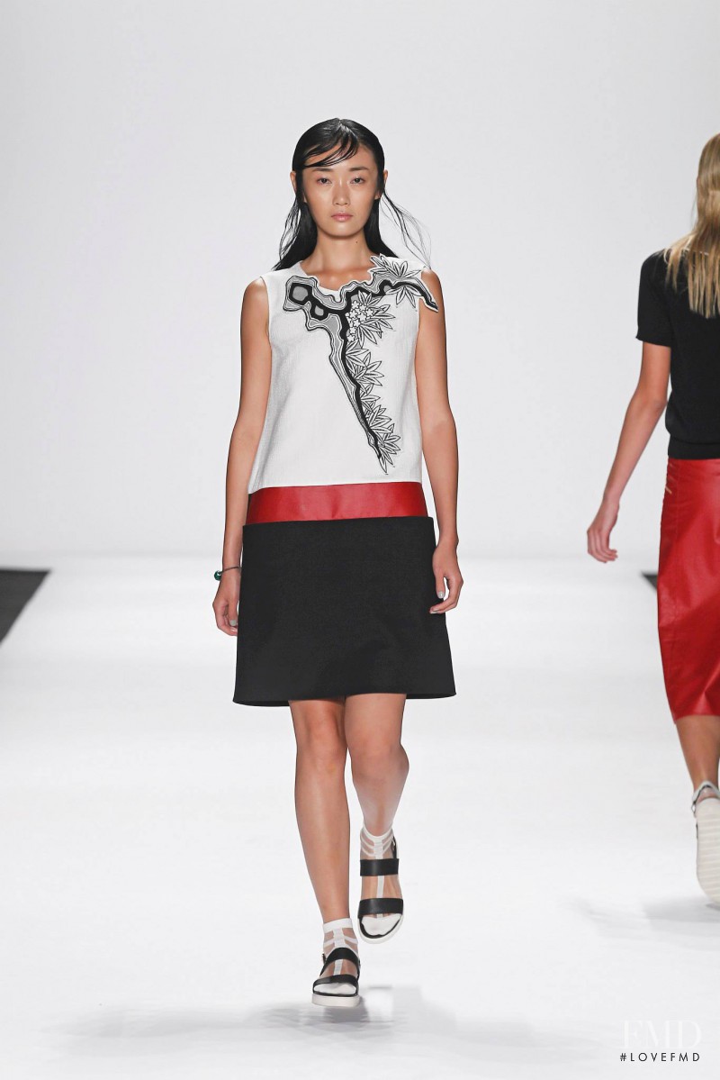 Yi Fei Li featured in  the Vivienne Tam fashion show for Spring/Summer 2015