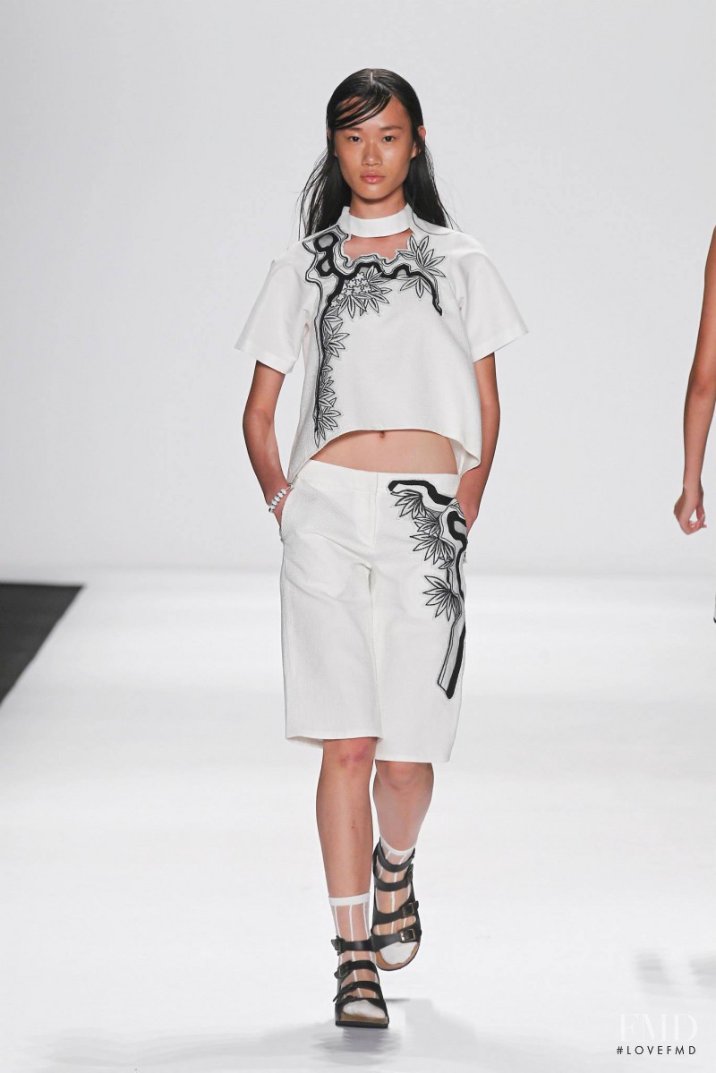 Hui Jun Zhang featured in  the Vivienne Tam fashion show for Spring/Summer 2015