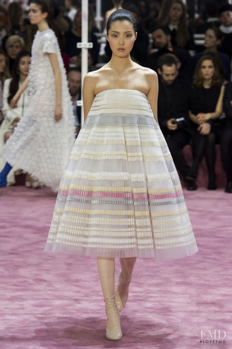 Sung Hee Kim featured in  the Christian Dior Haute Couture fashion show for Spring/Summer 2015