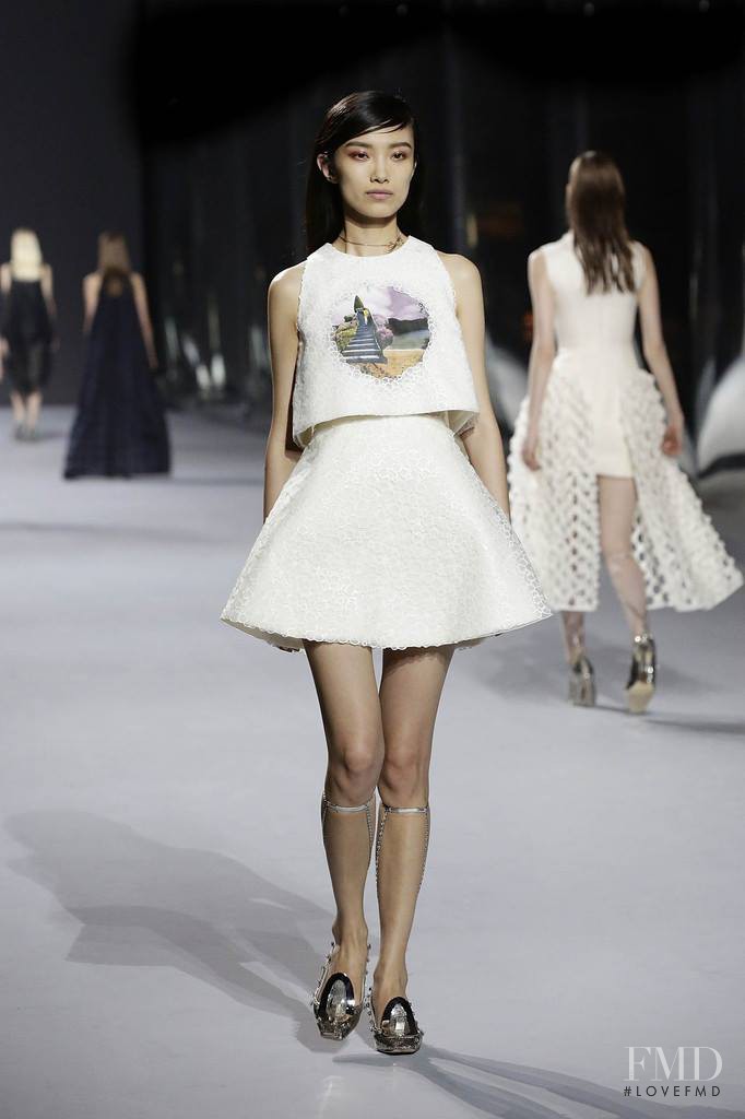 Meng Die Hou featured in  the Christian Dior Haute Couture fashion show for Spring/Summer 2014