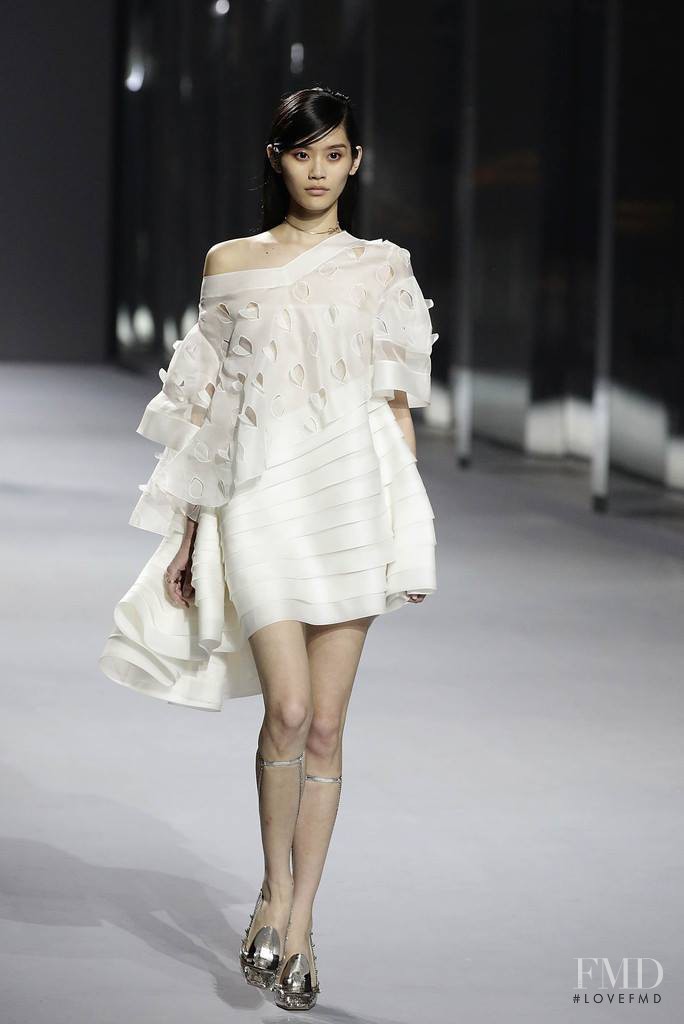 Ming Xi featured in  the Christian Dior Haute Couture fashion show for Spring/Summer 2014